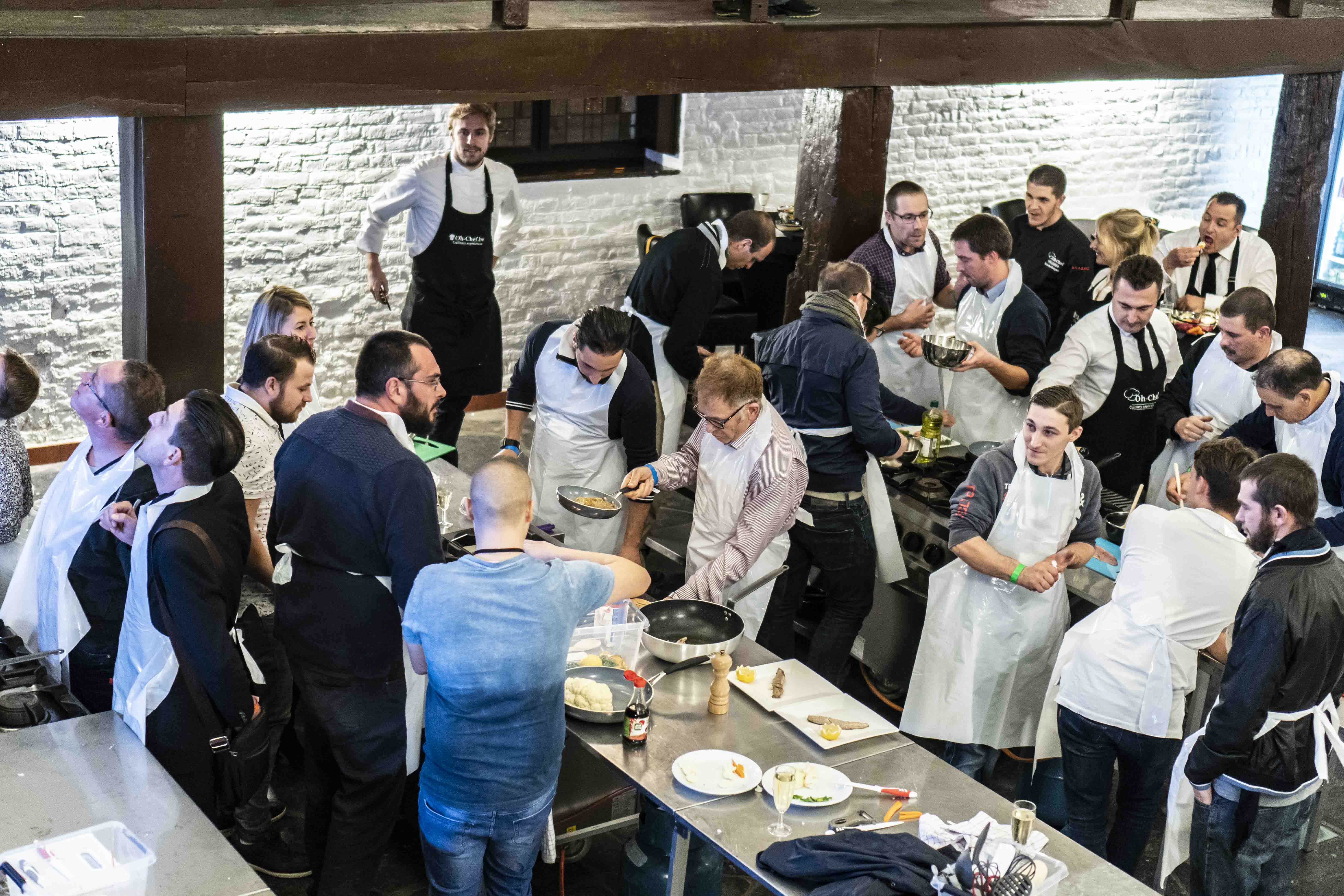 Équipe participant à un team building culinaire Oh-Chef à Bruxelles